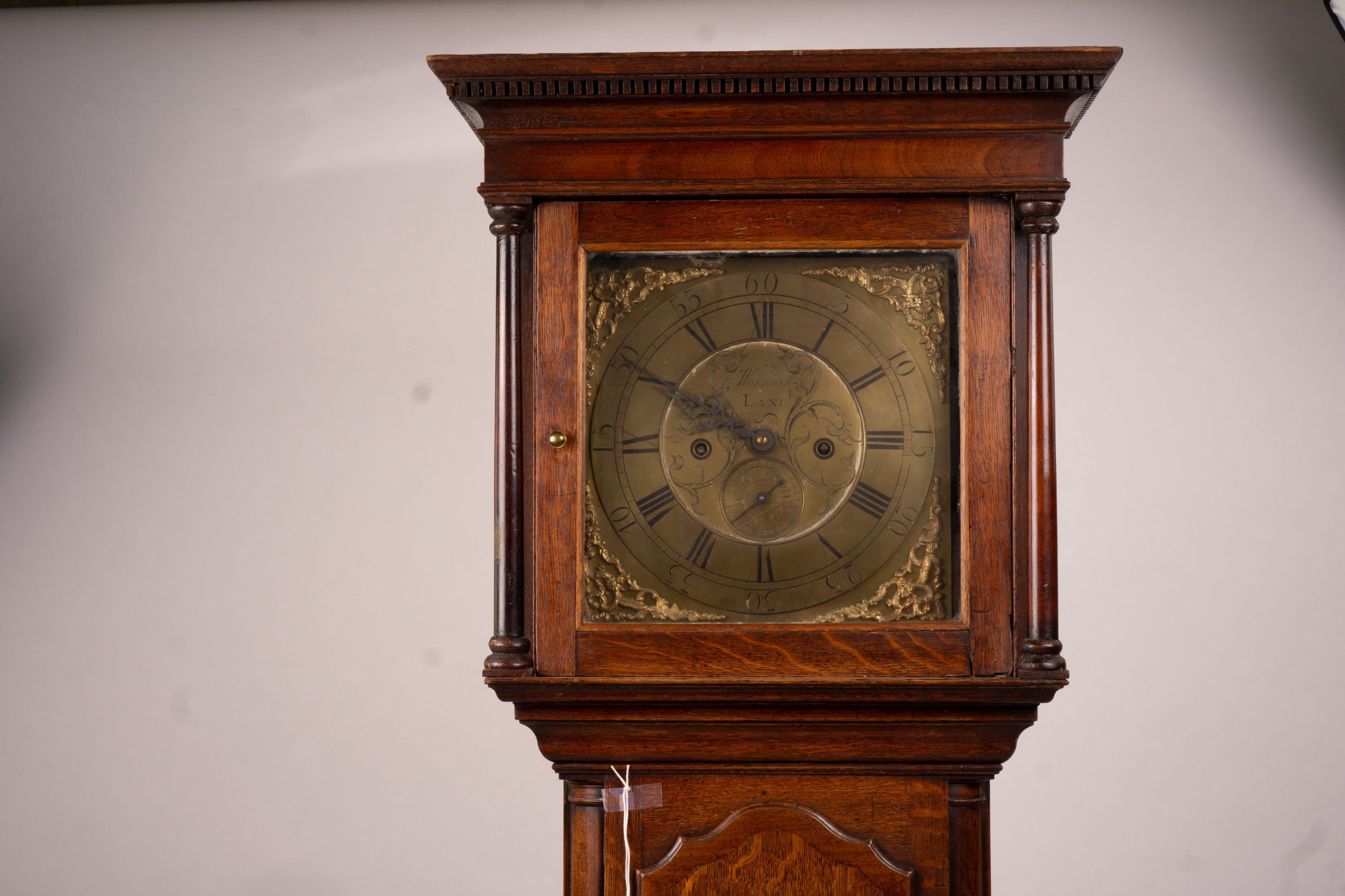 A George III oak 8 day longcase clock, marked Thomas Worswick of Lancaster, height 210cm